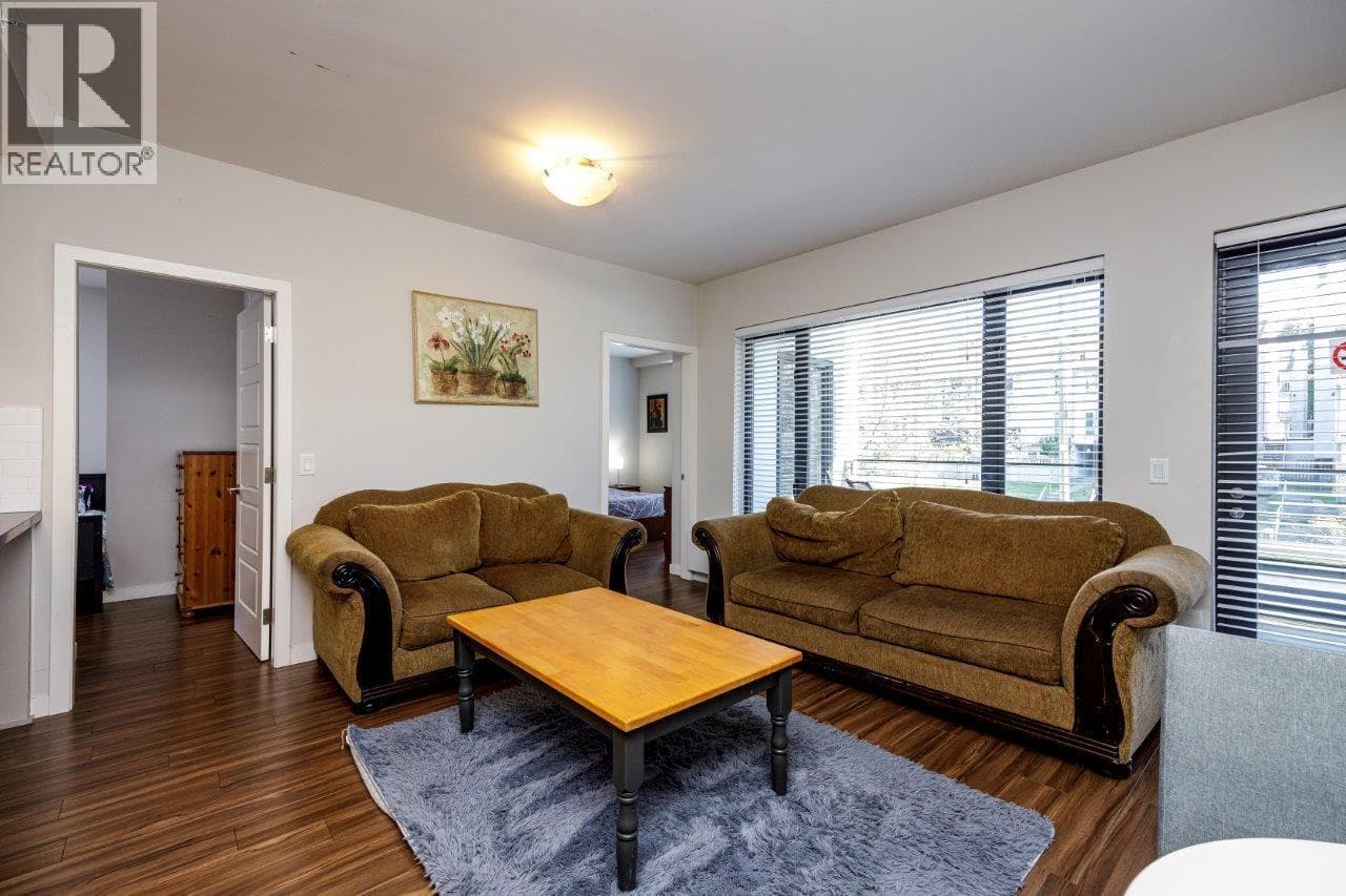 209 215 W 1ST STREET